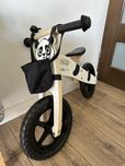 Drewniany rowerek panda
