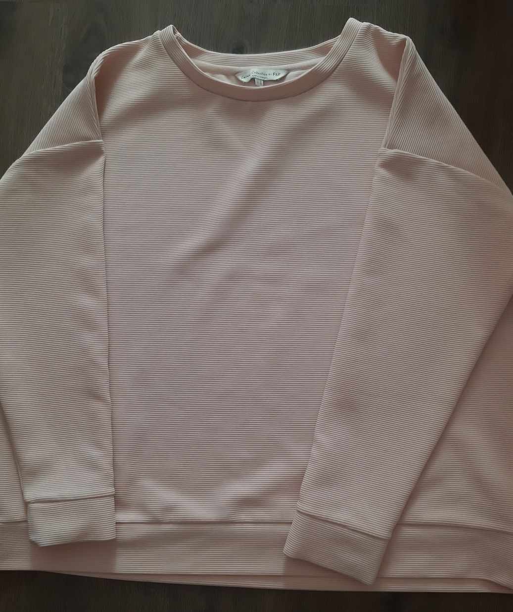 Женская блуза нежно-розового цвета