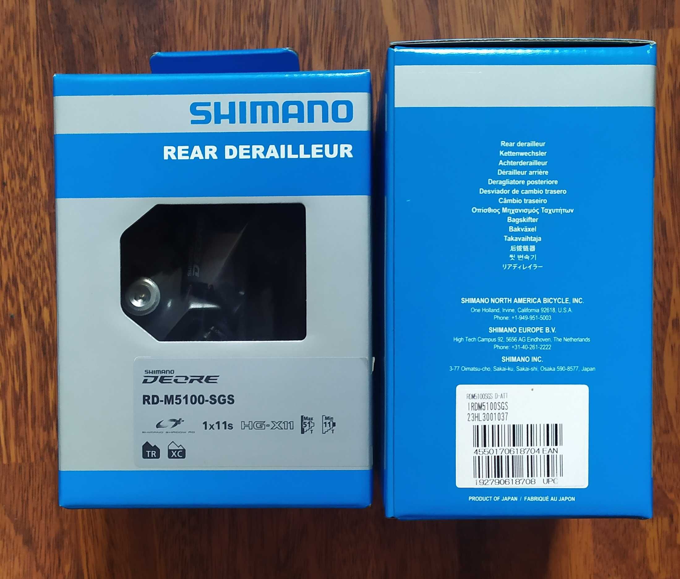 Задній перемикач Shimano Deore; SLX;(ХТ) 7--12 швидкостей