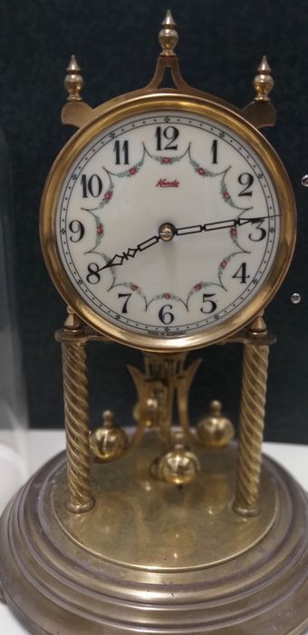 Relógio kundo pendulo giratório 400 dias