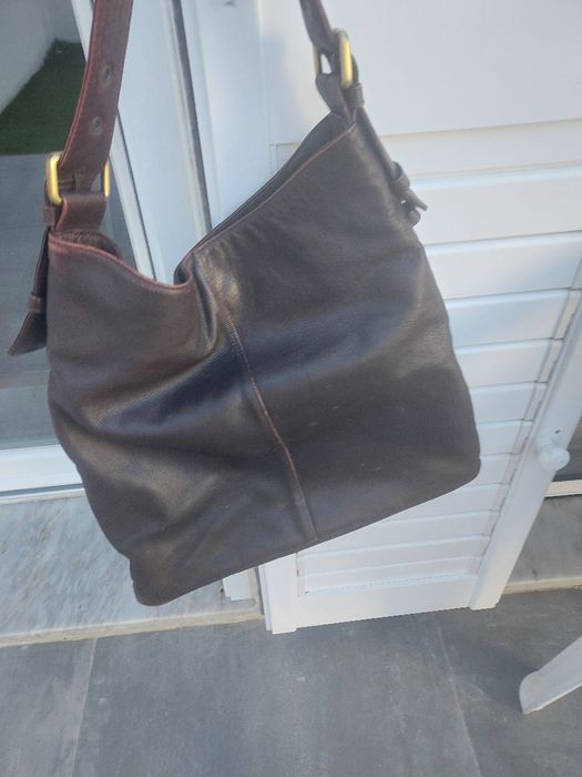 Mala de mulher em pele castanha