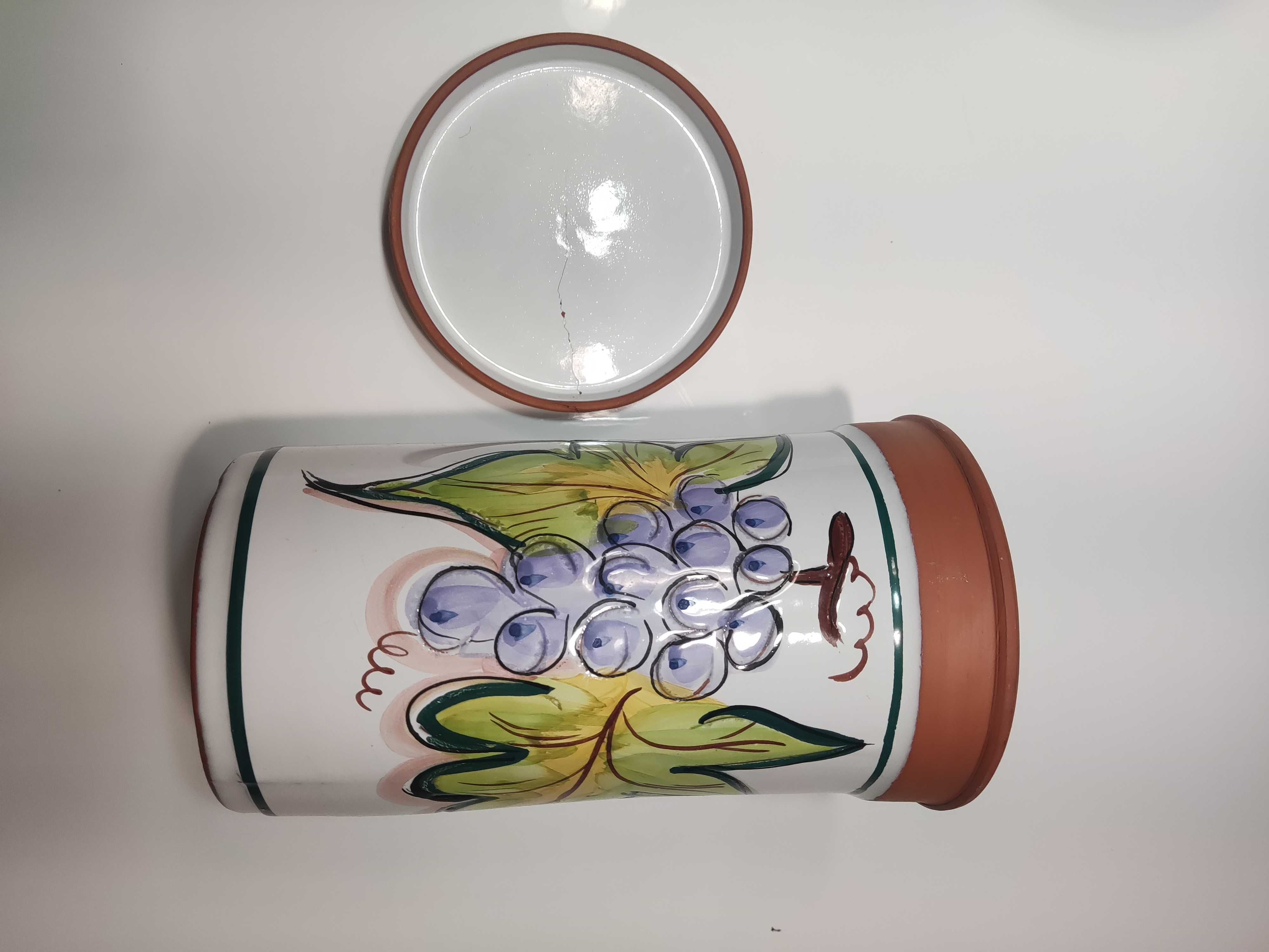 Vaso de flores em barro