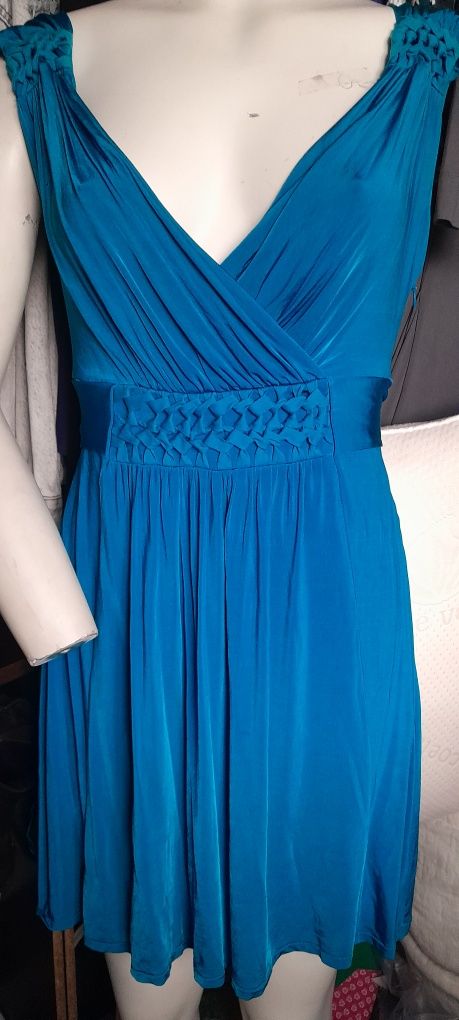 Vestido em malha,  Decénio. Tamanho,  S .20€ .