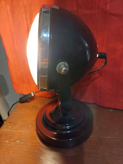 Candeeiro com farol de mota Vespa 
Artigo bem acondicionado.
Recomendo