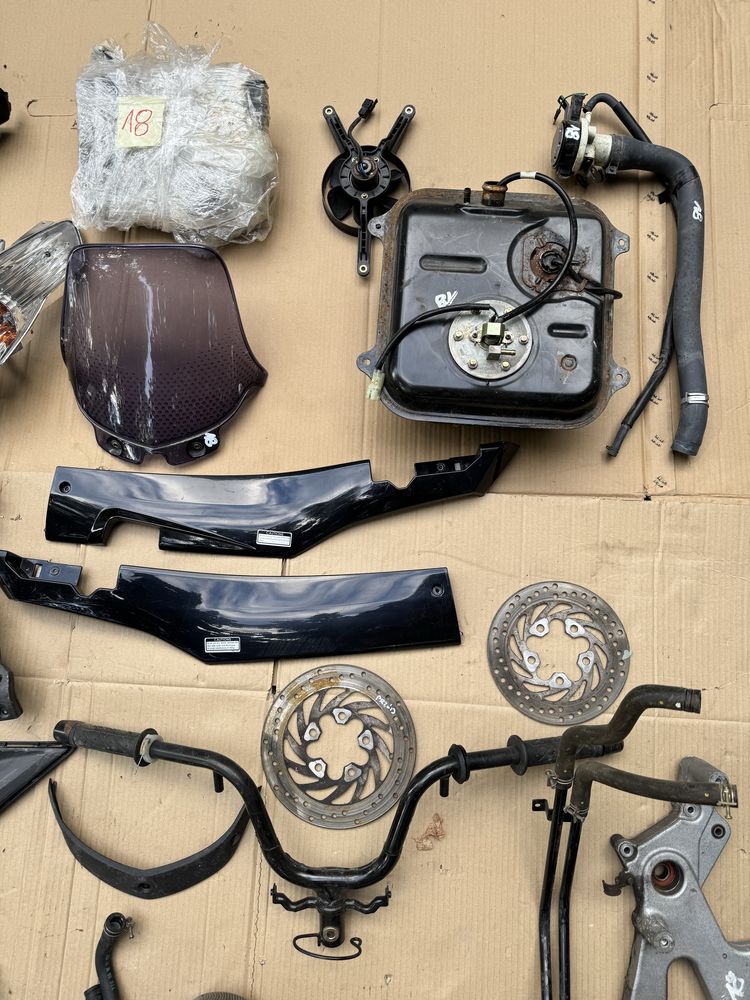 Kymco Dink 200 200i owiewka lampa szyba licznik tarcza nosek części