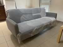 Manta sofa na cor cinza novo