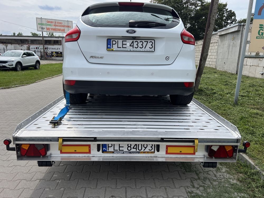 Wynajem laweta przyczepa do transportu samochodów pojazdów aut