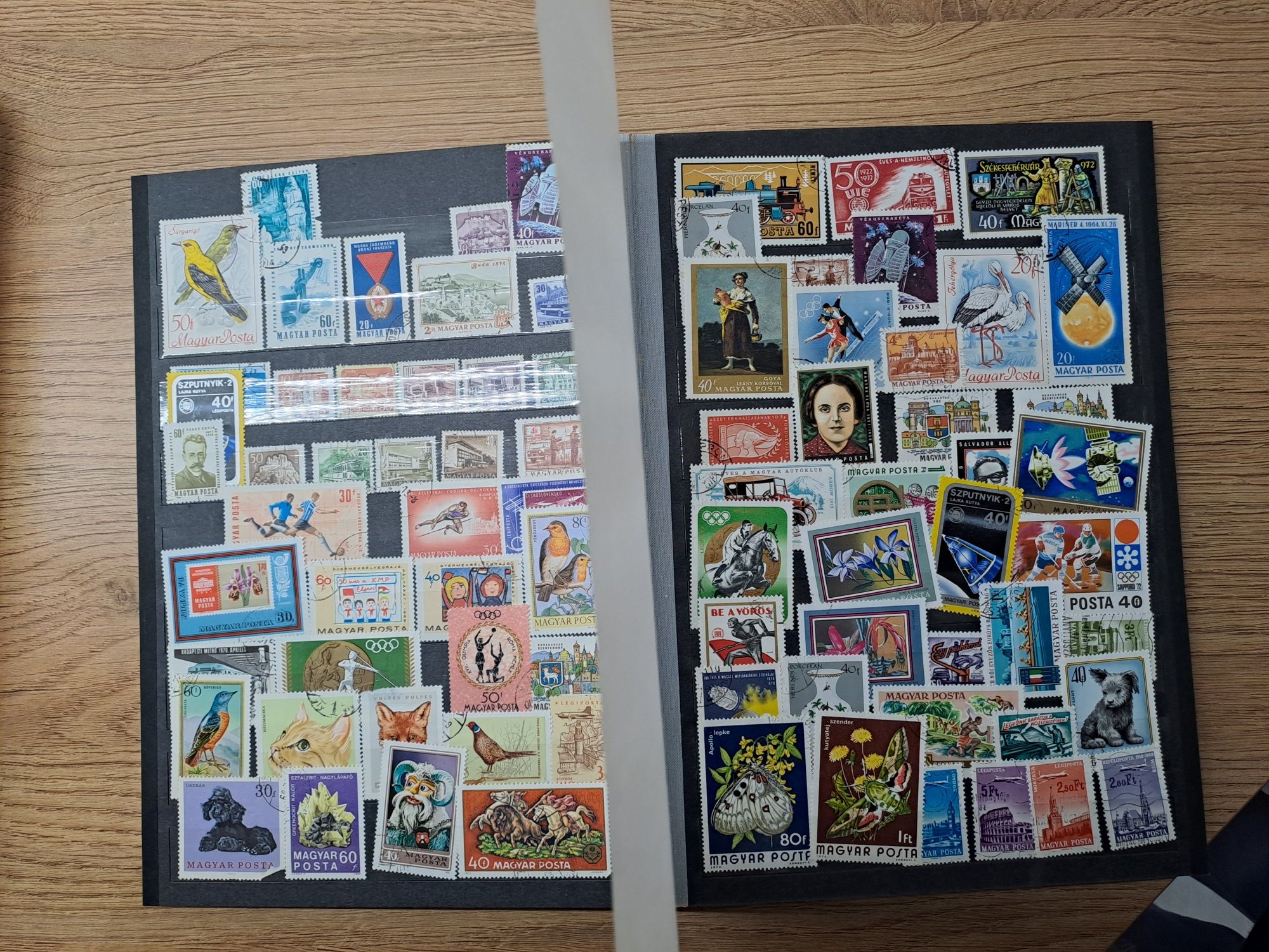 Stare znaczki pocztowe - 715 szt. w klaserze