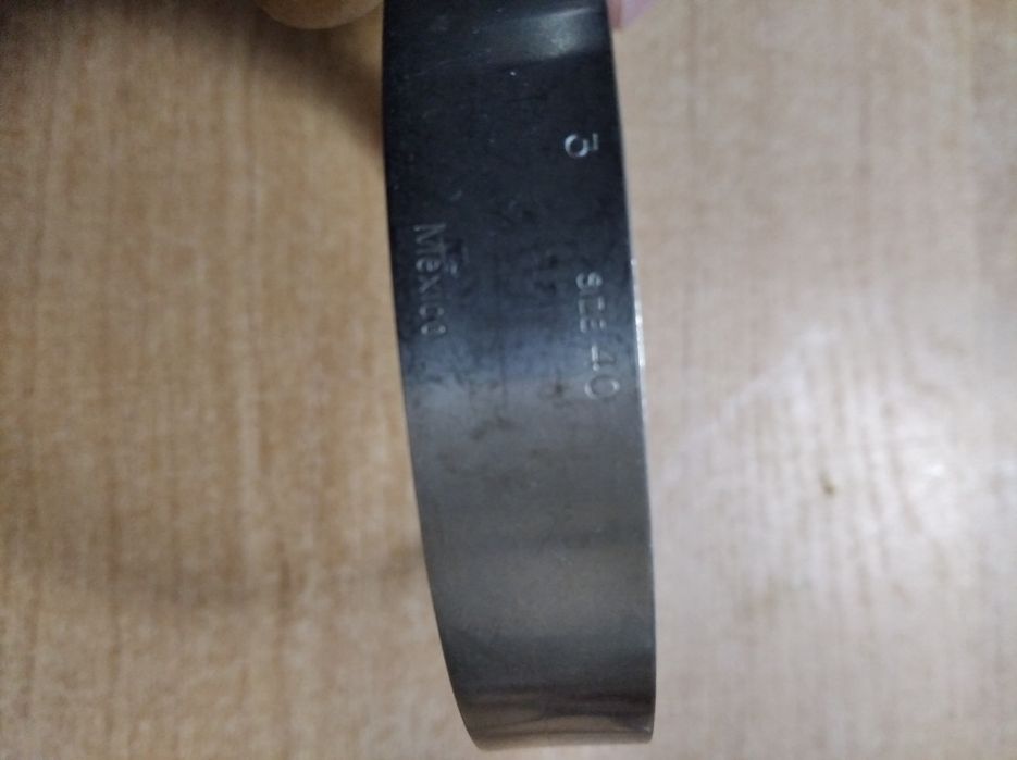 Opaska taśmowa że sprężyną  kompensacyjną