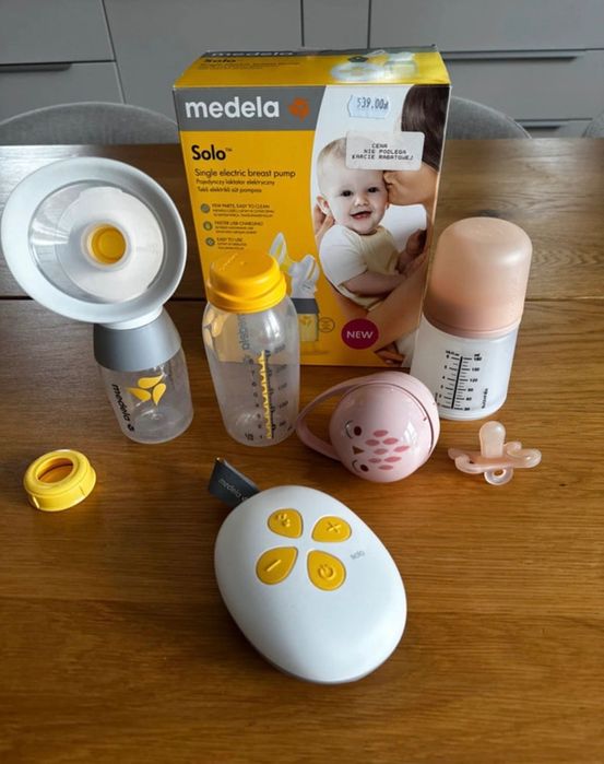 Laktator medela solo nowy +butelka i smiczwk sauvinex