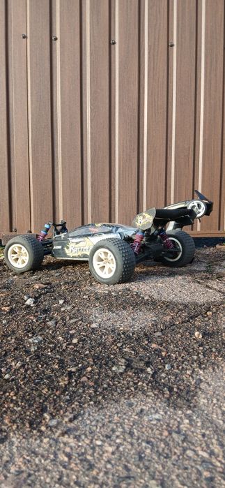 Продам радиоуправляемую машинку багги 1:8 traxxas wltoys remmo hobby