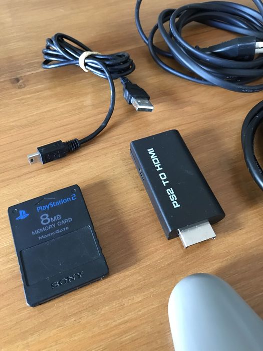 PS2 fat + comando + jogos