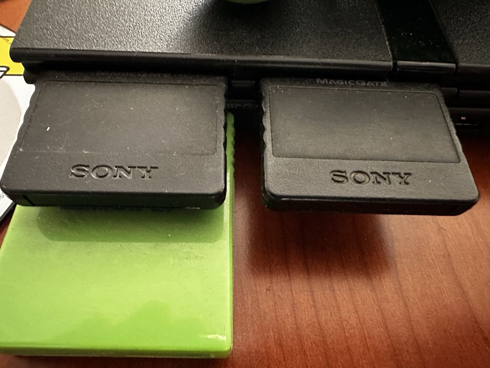 PlayStation 2 com vários jogos