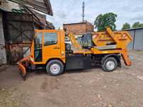 Unimog UX100 kontener, pług, posypywarka, bramownica