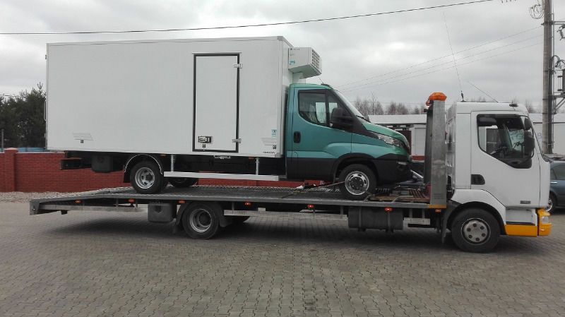 Laweta pomoc drogowa koparka widlak bus kamper przyczepa domek