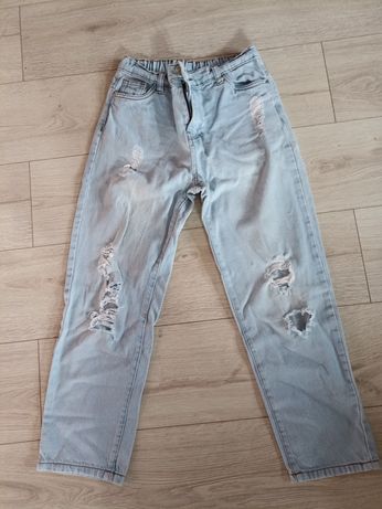 Spodnie jeansy przecierane