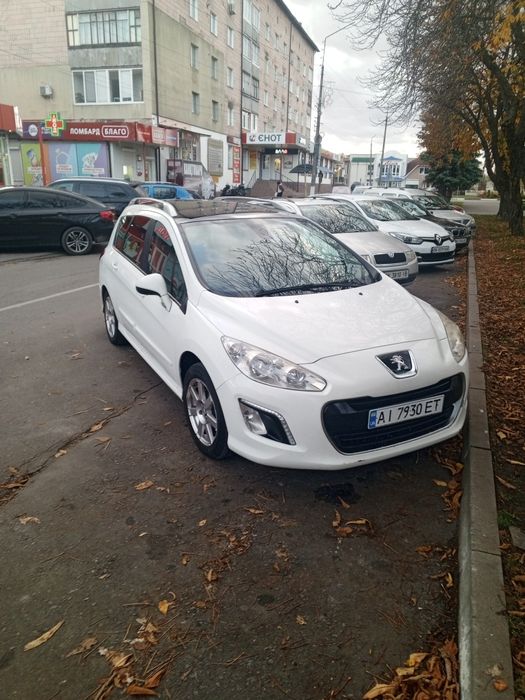 Пежо 308 універсал 7 мість