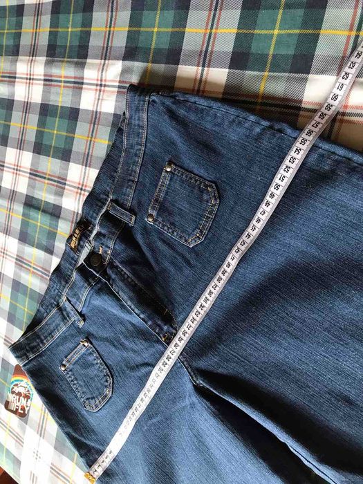 Новые джинсы широкие к низу клеш  Run&Fly размер 54-56.