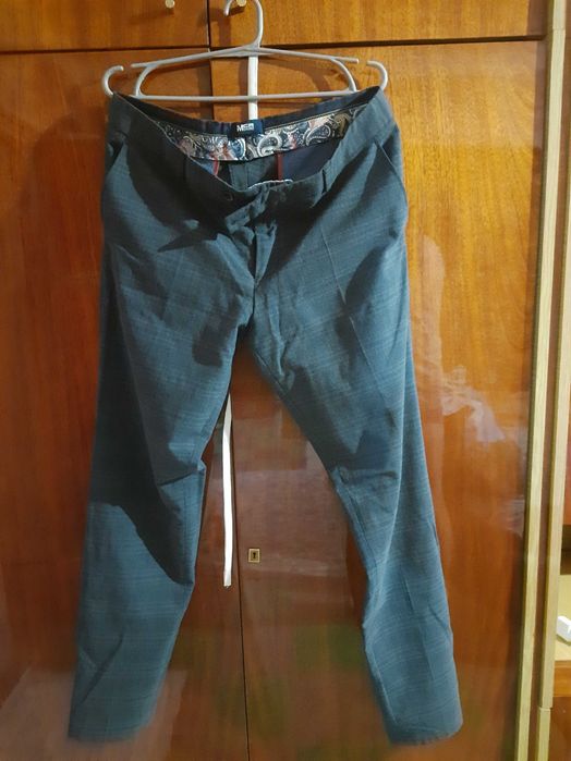Нові та стильні брюки р.48 довжина 105см.