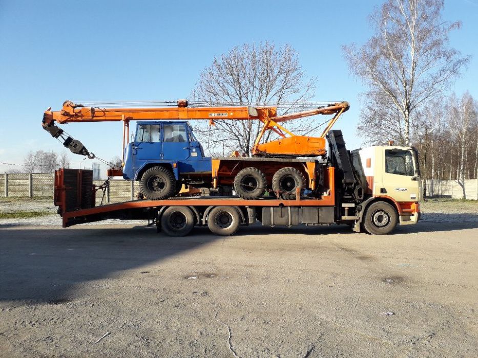 Transport maszyn budowlanych, kontenerów - laweta z HDS
