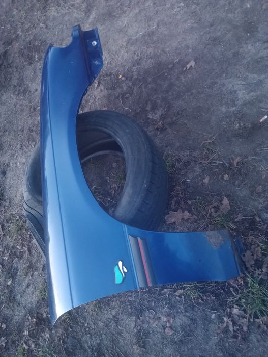 Opel Astra F l 1 błotnik prawy przód przedni