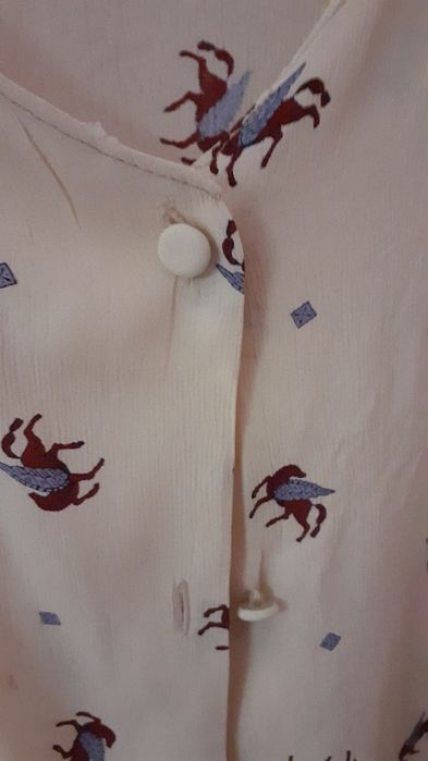 2 € Blusa XL de manga curta, botões forrados, tecido fresco