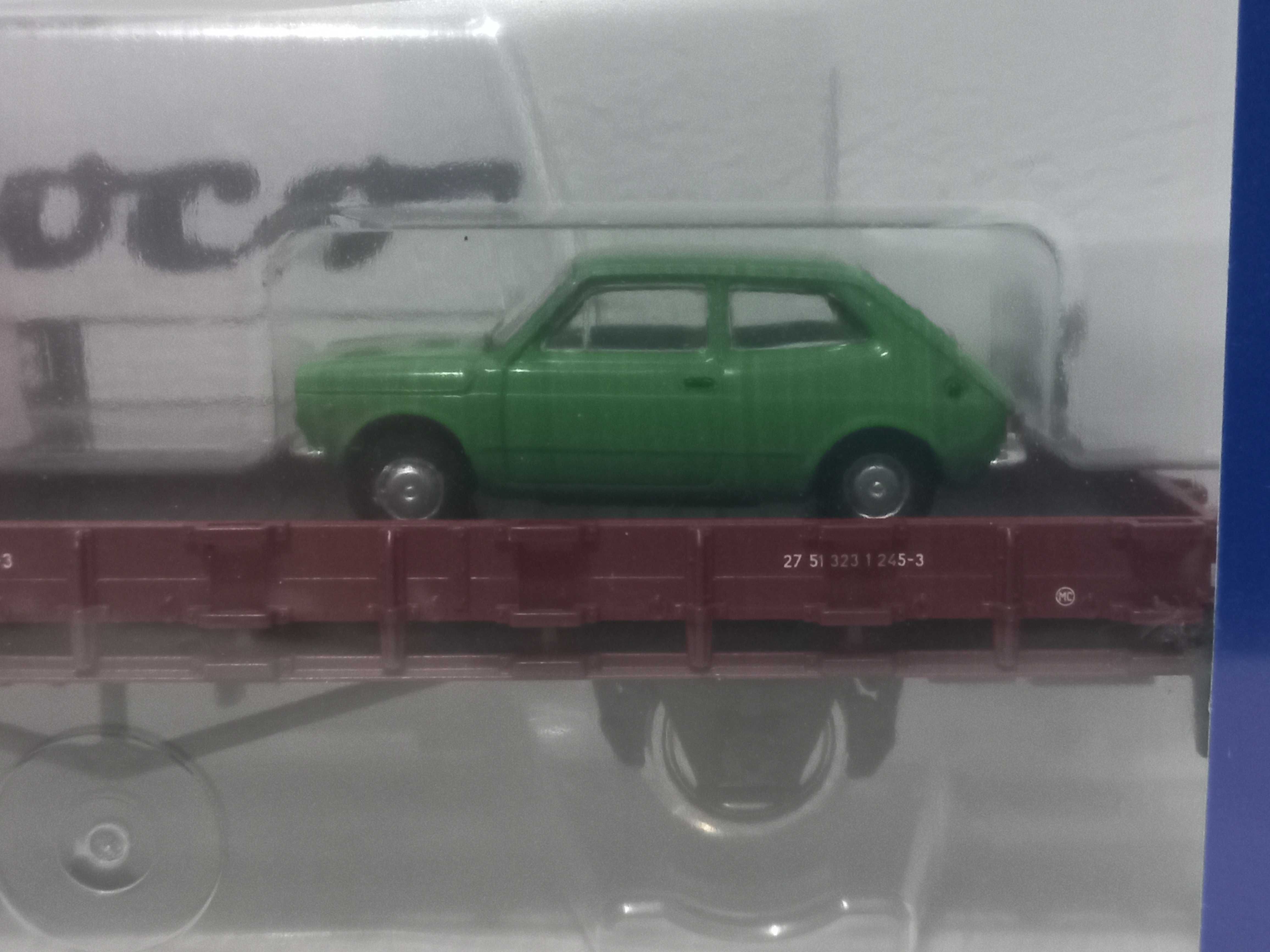Fabrycznie nowy wagon platforma z samochodami PKP Roco 76764
