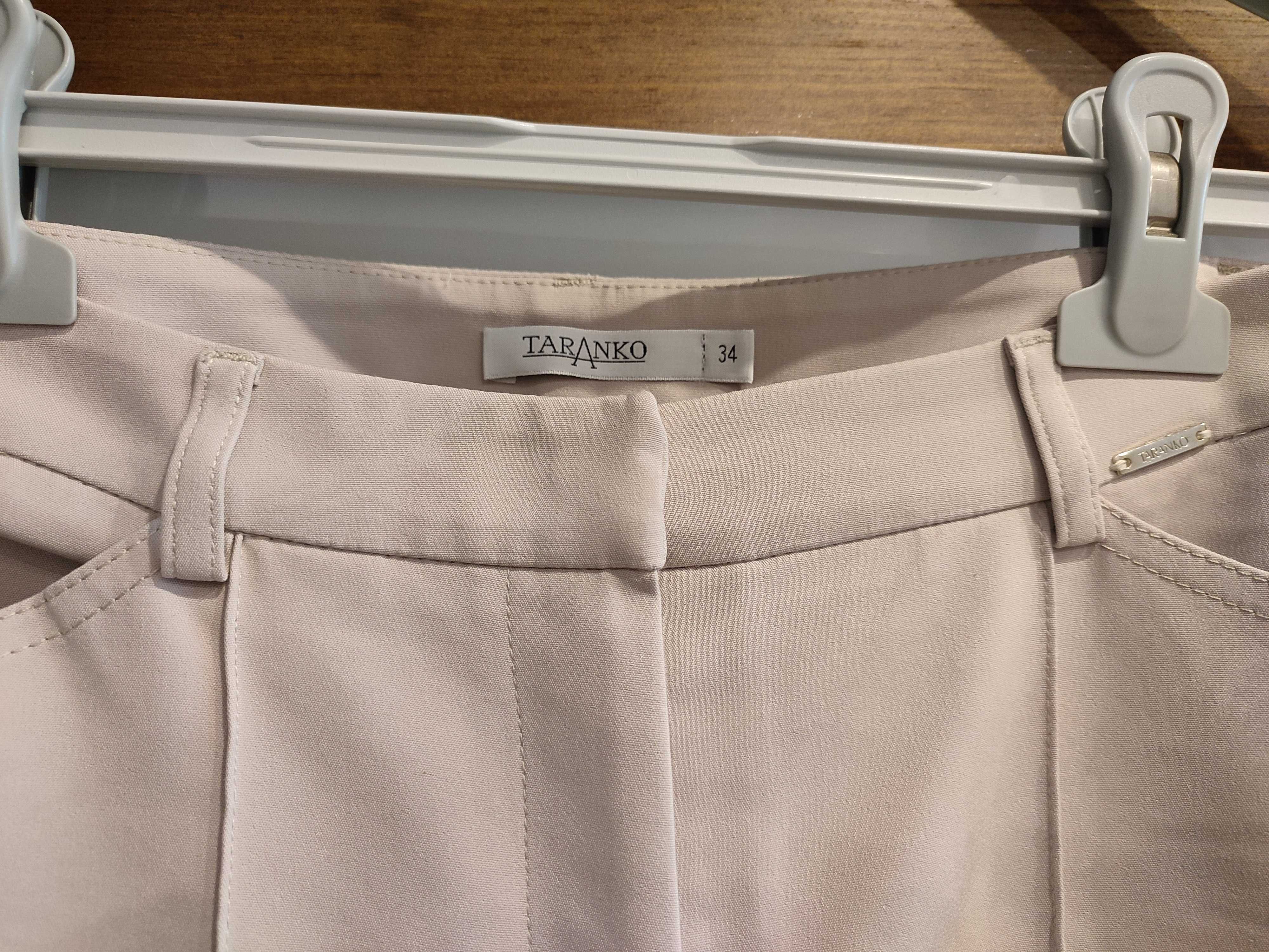 spodnie cygaretki TARANKO r. 34 beżowe ze złotymi suwakami