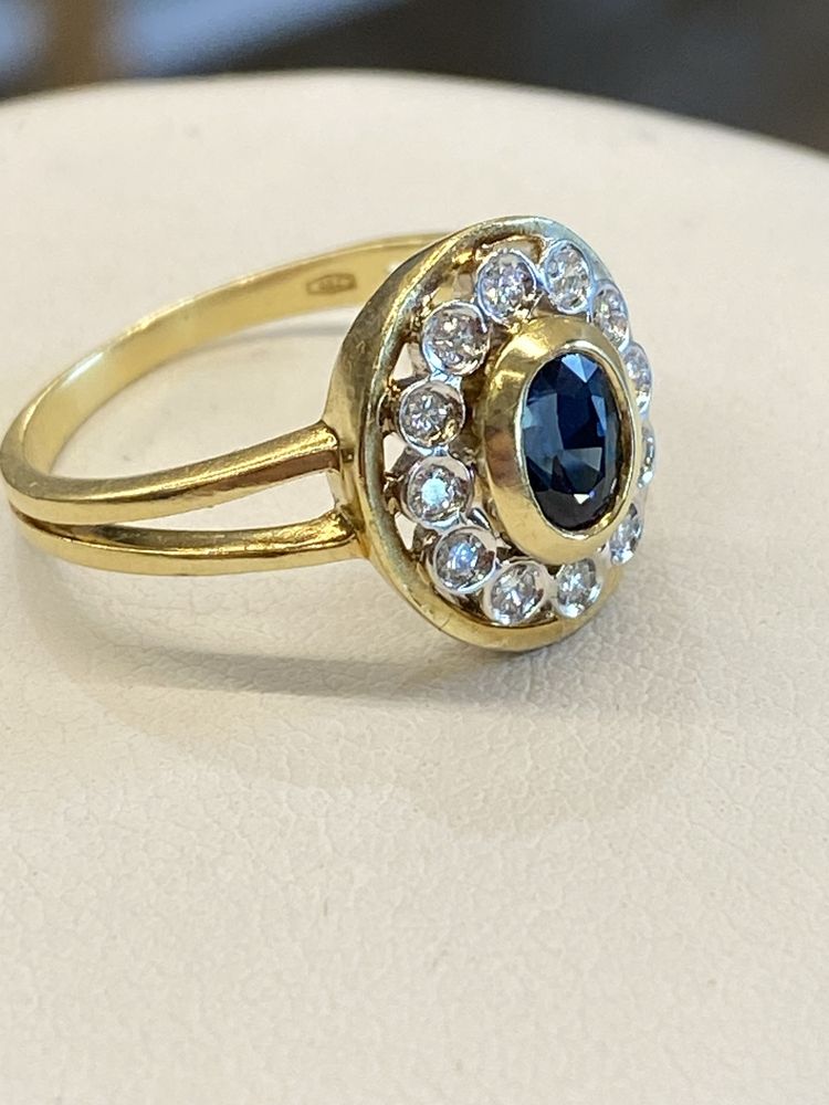Złoty pierścionek z szafirem i diamentami 0,25ct CERTYFIKAT