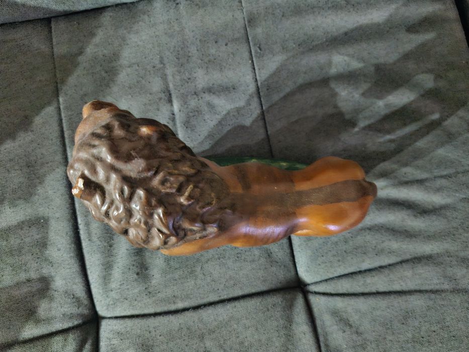 Leão antigo em cerâmica