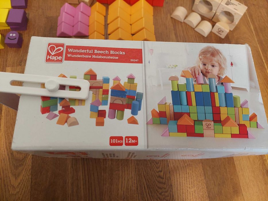 Drewniane klocki edukacyjne Hape i Cubika, kolorowe, 131 el.