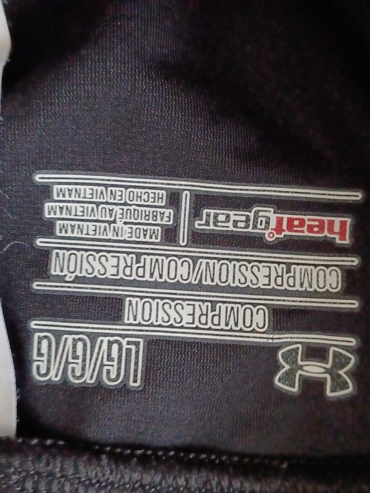 Legginsy sportowe damskie 7/8  run rozm L  Under Armour