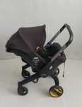 Mobilny fotelik Doona - wózek 2w1 - Black