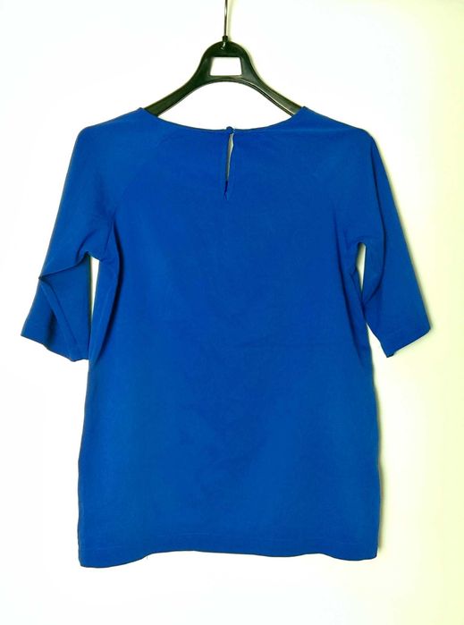 Zwiewna niebieska bluzka krótki rękaw Diverse S