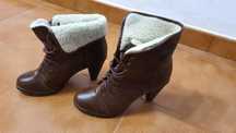 Botas praticamente novas
