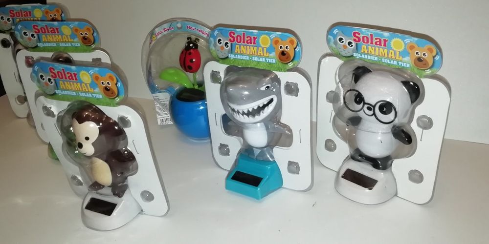 Танцкющая фигурка на солнечной батареи обезьяна панда дівчина