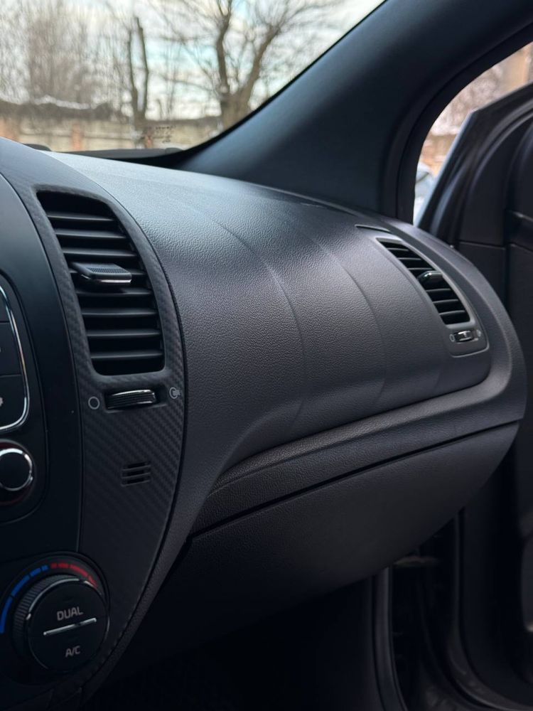 KIA Cerato Koup 1.6 T-GDi ( 204 л.с. ) 2014 год