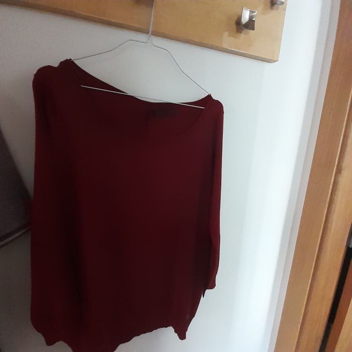 Excelente camisola  praticamente nova