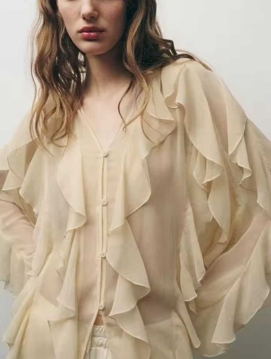 Багатошарова легка шифонова блуза з воланами, рюшами