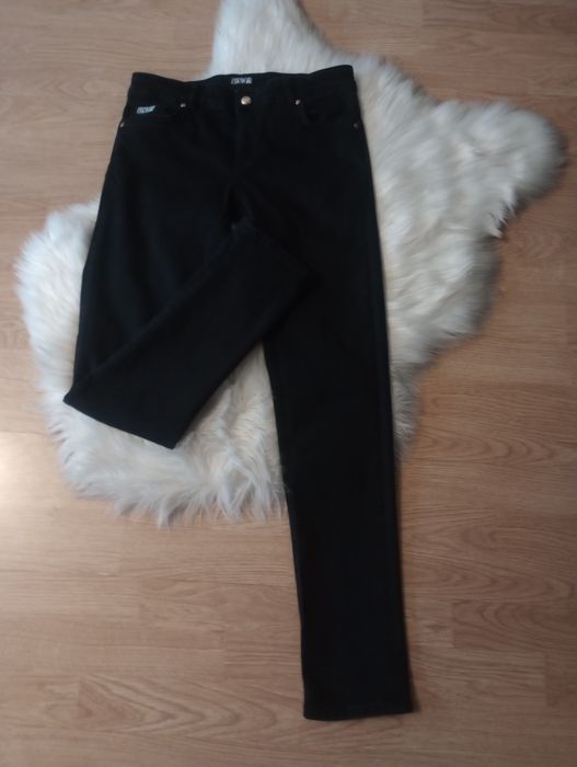 Spodnie czarne jeansowe Versace