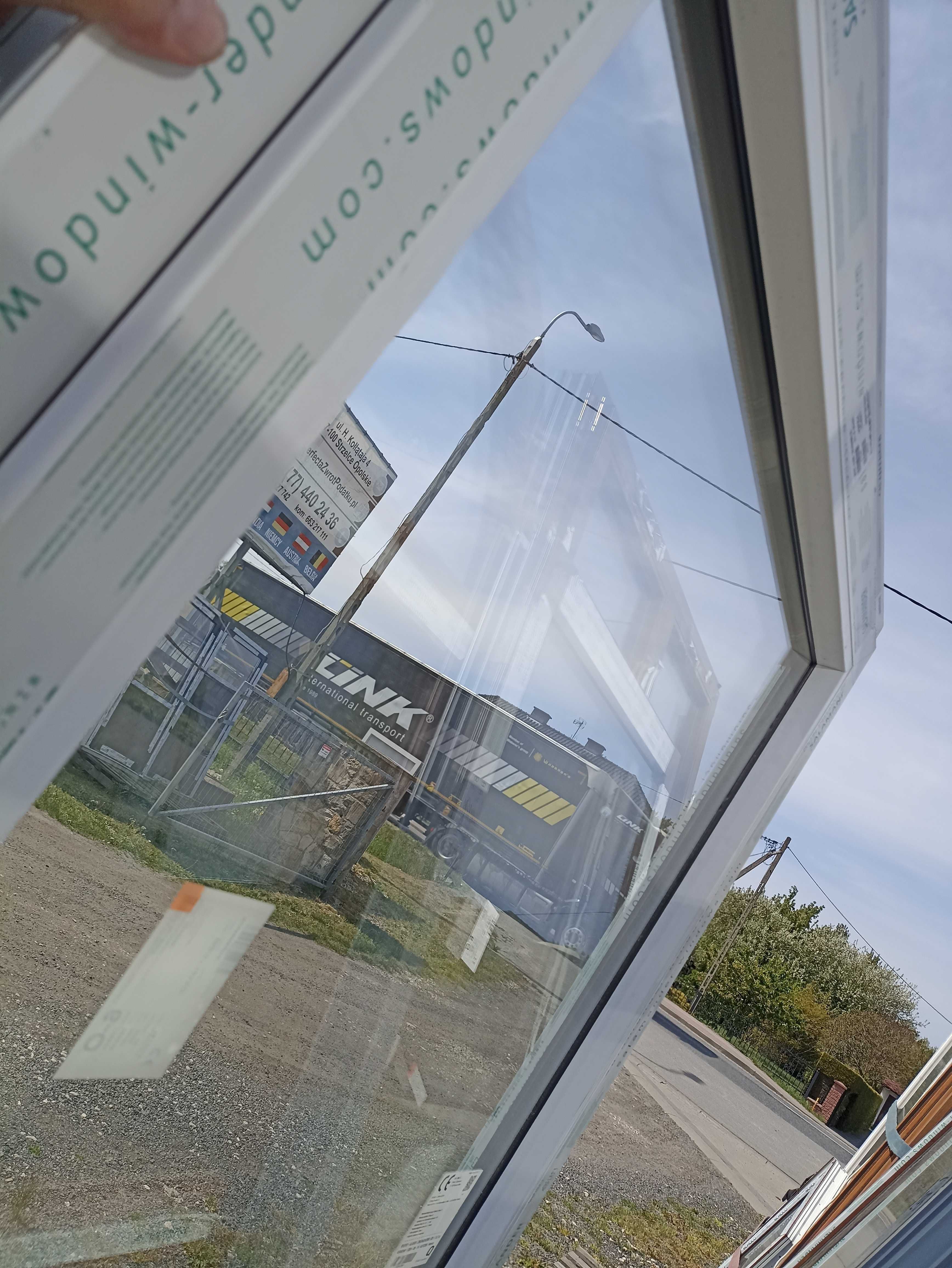 Okno balkonowe z fix 222/203 brąz
