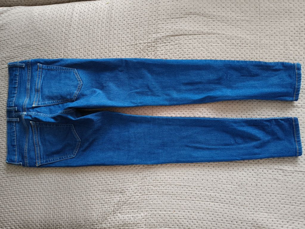Długie spodnie jeansowe rurki skinny 28 M