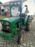 Trator John Deere ,frese ,charrua e reboque basculante