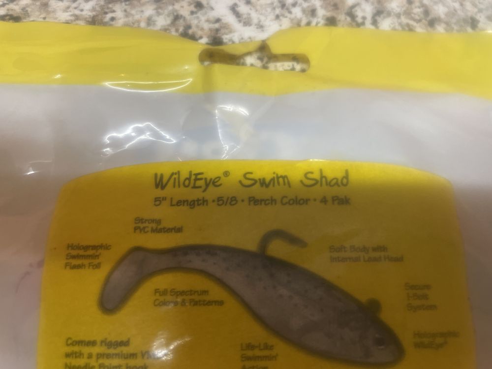Embalagem de 4 amostras de pesca marca STORM mod swim shad 5”