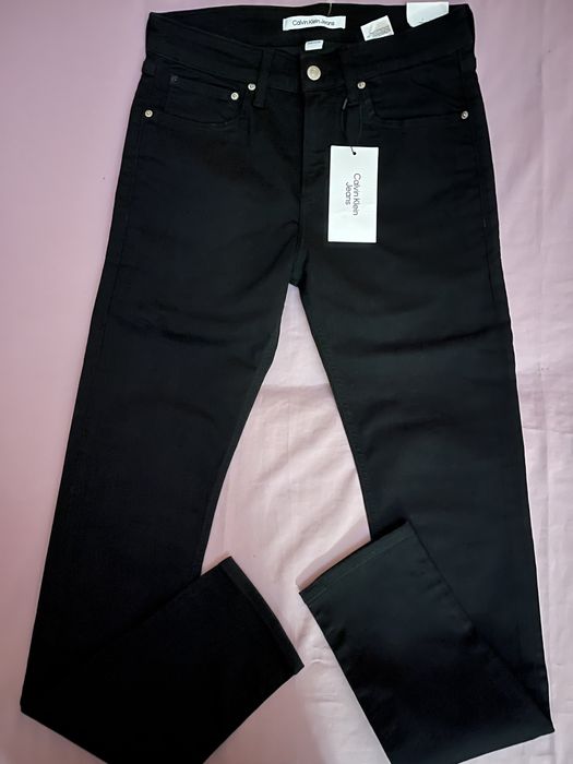 Wyprzedaż spodnie męskie Calvin Klein Jeans.