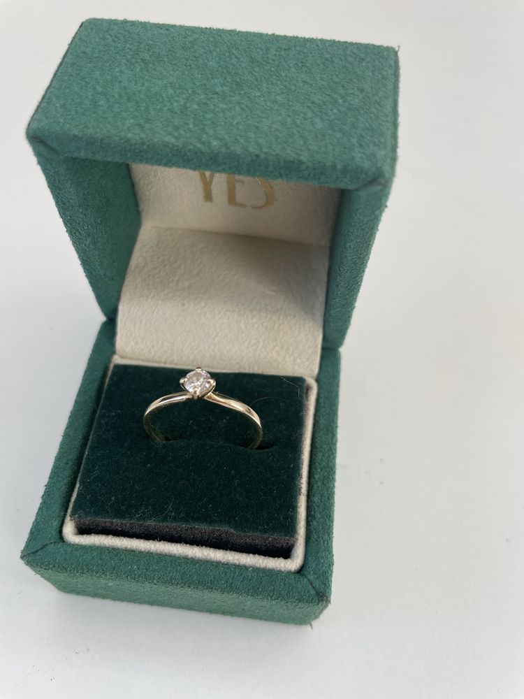 Sprzedam złoty pierścionek z brylantem 0,2 ct rozmiar 13