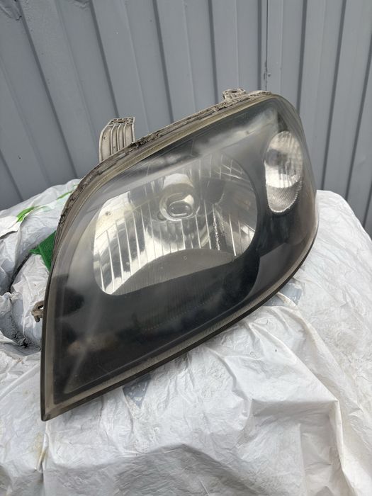 Фара левая авео т250