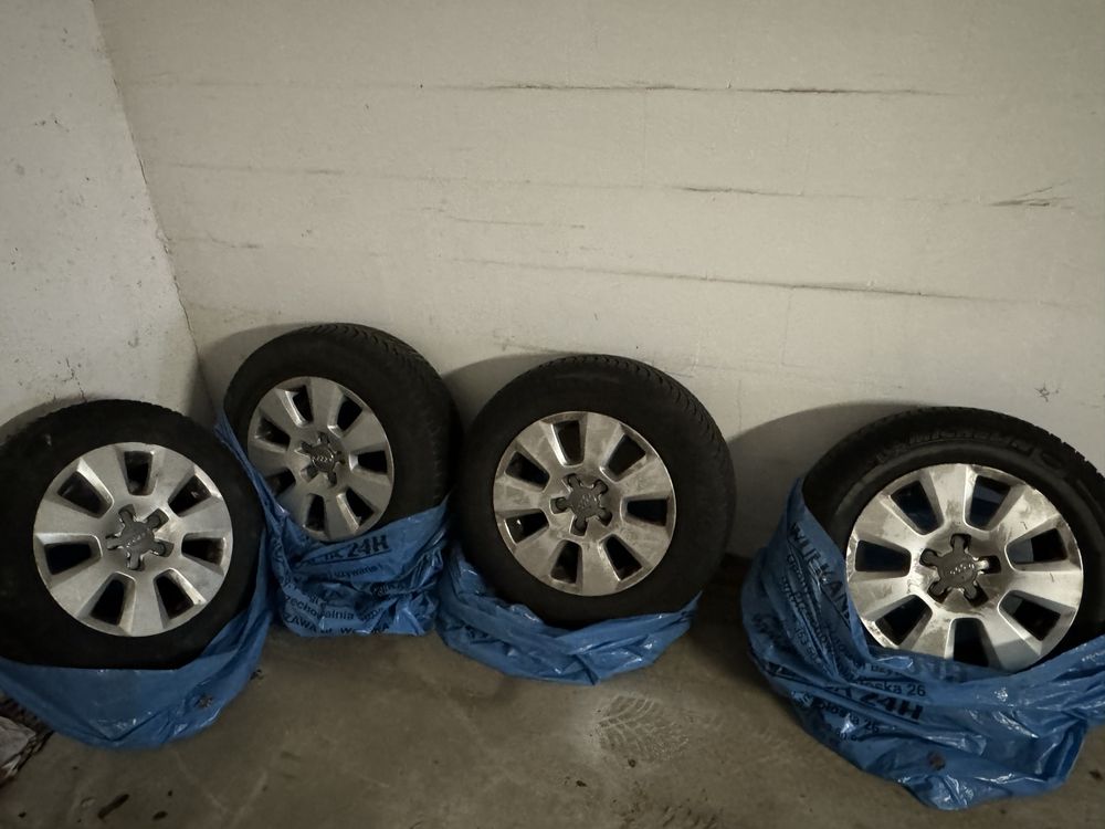 Oryginalne felgi 16 Audi z oponami zimowymi Michelin