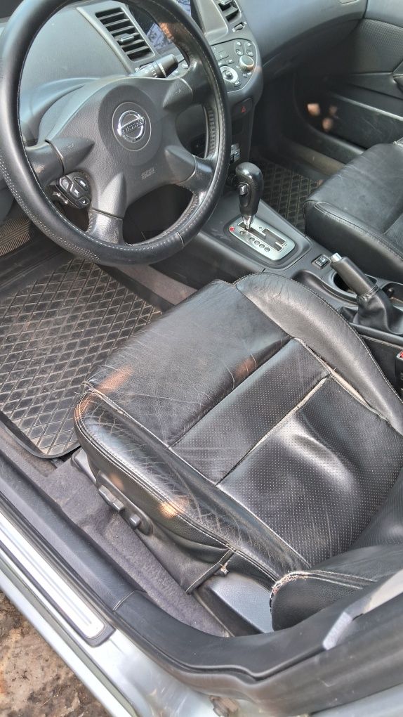 Nissan Primera P12