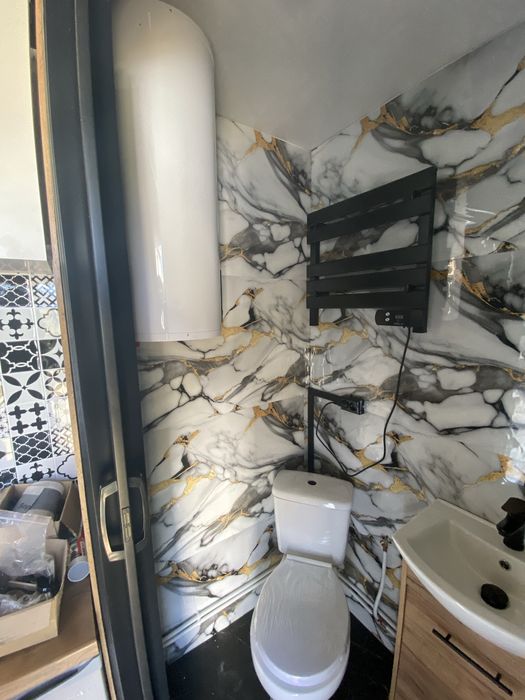 Caloroczny domek tiny house na kolkach